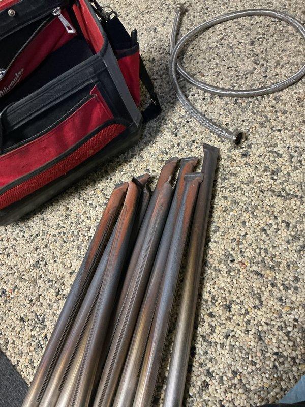 Completed scheduled maintenance service on Weil-McLain boiler system. Performed comprehensive inspection of copper heat exchanger tubes and associated piping. Cleaned components, checked all connections, and verified proper system operation during the 2-hour contract maintenance visit.