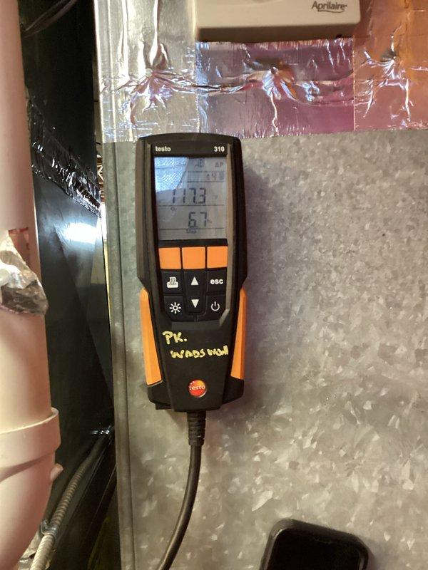Performed routine heating maintenance on residential HVAC system. Conducted pressure differential testing using Testo 310 analyzer showing readings of 7.73/6.7, and verified gas pressure measurements (325) with EM152 manometer. All system parameters within normal operating range; unit functioning properly after service.
