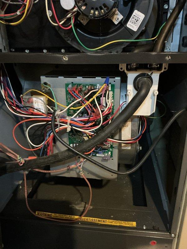 Performed routine maintenance on residential furnace system. Inspected blower motor assembly, control board, and electrical connections throughout unit. All components found to be in proper working condition with no issues identified.