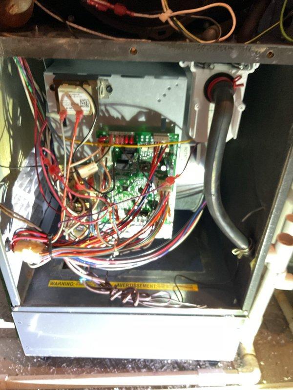 Responded to customer report of loud knocking noise from furnace during normal operation. Inspected system including control board, wiring connections, and blower assembly. Determined noise was caused by loose heat exchanger panels vibrating against housing during operation. Secured panels and verified proper system function with no abnormal noise during test cycle.