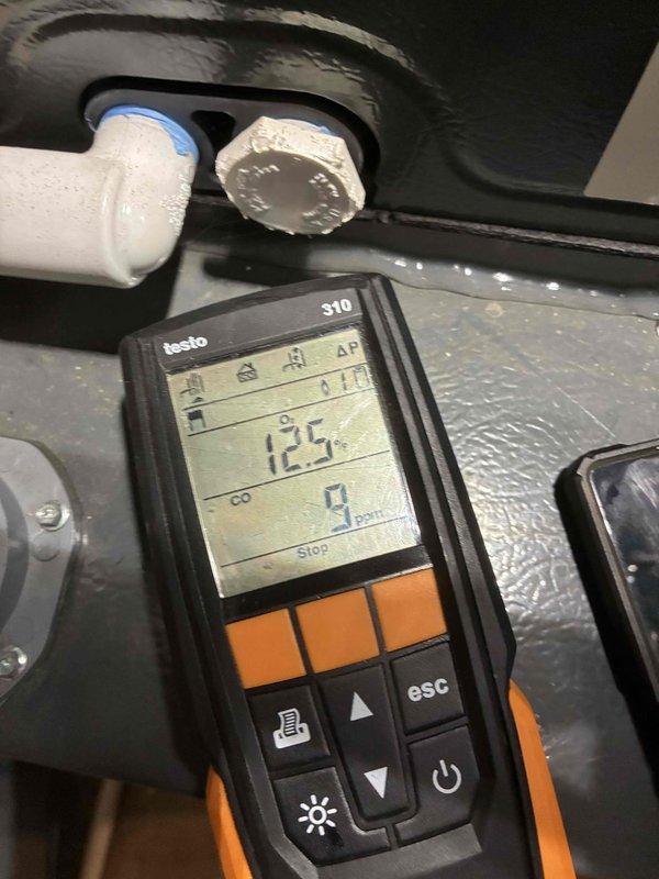Performed monthly heating maintenance service on HVAC system. Conducted electrical testing with clamp meter showing 67 amps and used Testo S10 device to verify system parameters with reading of 12.2. All components operating within normal specifications.