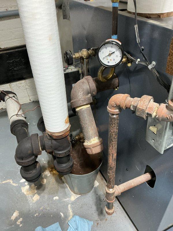 Performed scheduled heating tune-up as requested. Inspected copper piping system showing signs of oxidation and checked system pressure gauge readings. Examined and evaluated metal components with visible threading that showed signs of wear, ensuring all connections remain functional despite age-related discoloration.