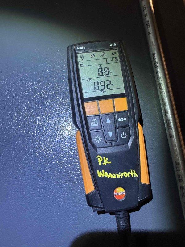 Performed monthly heating maintenance service on HVAC system. Conducted combustion analysis using Testo 310 analyzer, measuring O₂ and CO₂ levels (0.0 and 0.92 respectively). Inspected structural space housing equipment, noting significant cobweb accumulation and confirming proper wiring configuration.