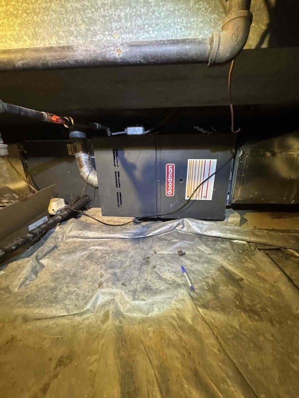 Responded to service call for Goodman furnace failing to maintain temperature above 61°F. Performed diagnostic inspection of system including examination of control board and electrical connections. Identified and corrected issue with furnace ignition sequence, restoring proper heating function to the system.