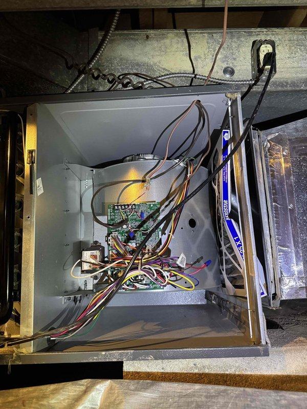 Responded to service call for Goodman furnace failing to maintain temperature above 61°F. Performed diagnostic inspection of system including examination of control board and electrical connections. Identified and corrected issue with furnace ignition sequence, restoring proper heating function to the system.