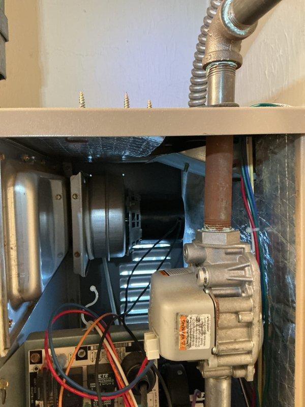 Performed monthly heating maintenance service on HVAC system. Inspected evaporator/condenser coils showing normal oxidation and examined pump assembly with attached copper piping. All components functioning properly with no issues identified.