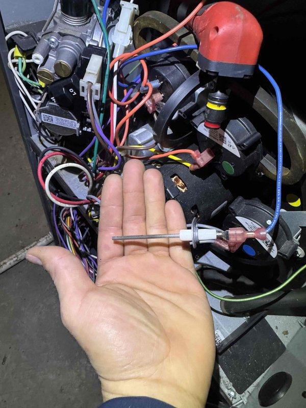 Responded to emergency no-heat call for 6-9 year old furnace with repeated cycling issues despite previous service attempts. Diagnosed faulty flame sensor, removed and replaced component to restore proper flame detection. System now operating normally with consistent heating cycles.