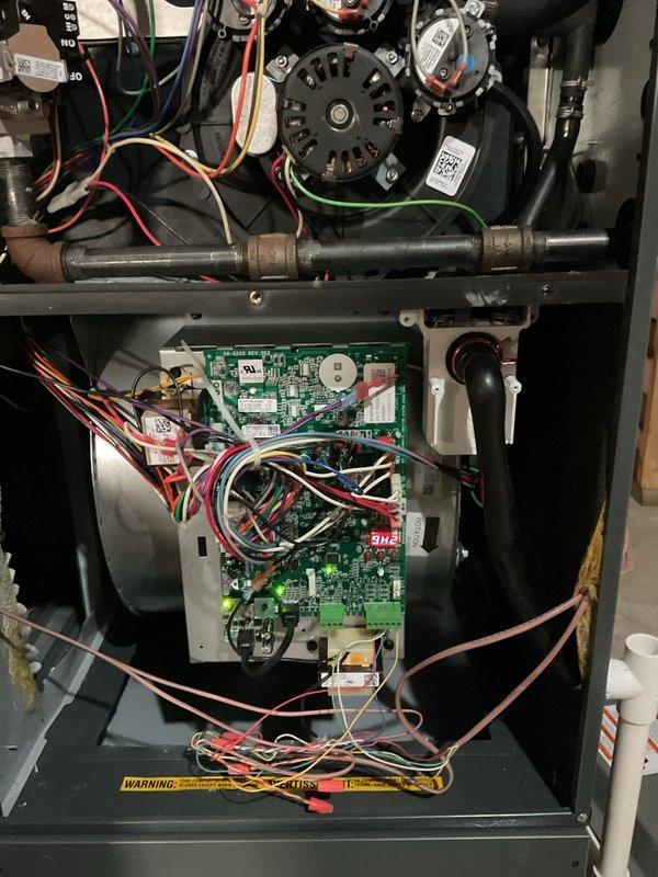 Responded to emergency no-heat call for 6-9 year old furnace system with complaint of minimal warm air from vents. Diagnostic inspection revealed faulty circuit board with LED indicator showing error code. Replaced defective control board, reconnected all wiring harnesses, and verified proper operation of blower motor and heating sequence. System now functioning correctly with appropriate heat output.