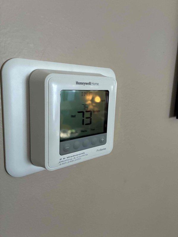 Responded to service call for a Honeywell thermostat issue causing continuous furnace operation despite set temperature. Diagnosed faulty thermostat wiring connection to H.L. Wadsworth heating unit. Rewired thermostat connections and verified proper cycling, confirming system now maintains desired temperature and operates without the previously reported noise issues.