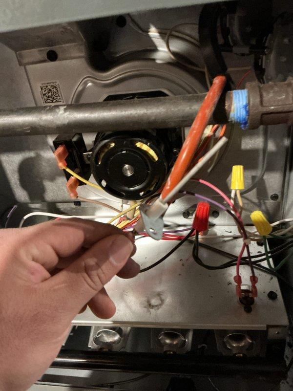Conducted heating maintenance service on Amana HVAC system to address thermostat programming issues. Inspected internal components including motor assembly, electrical connections and wiring. Resolved random temperature change problem by reprogramming thermostat and provided customer with requested magnet.