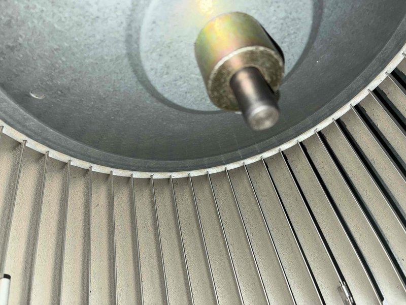 Performed routine heating maintenance service on residential furnace system. Inspected and cleaned blower assembly components including fan wheel and shaft coupling. System appears to be in proper working order with no issues identified.