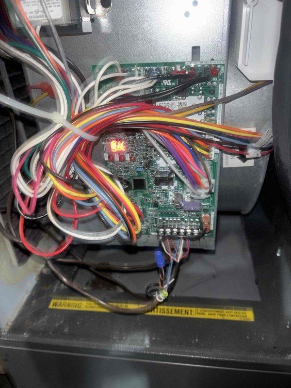 Performed scheduled heating maintenance on system. Inspected control board and wiring connections in main control panel, confirming proper LED indicator operation. Checked temperature sensor mounted on ductwork and verified all electrical connections were secure with no signs of damage or wear.