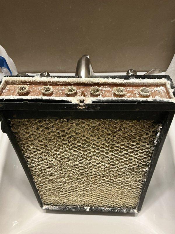 Performed annual MVP maintenance on customer's heating system. Removed and cleaned severely dust-impacted Aprilaire component which was restricting airflow and reducing system efficiency. Reinstalled after thorough cleaning to restore proper system functionality.