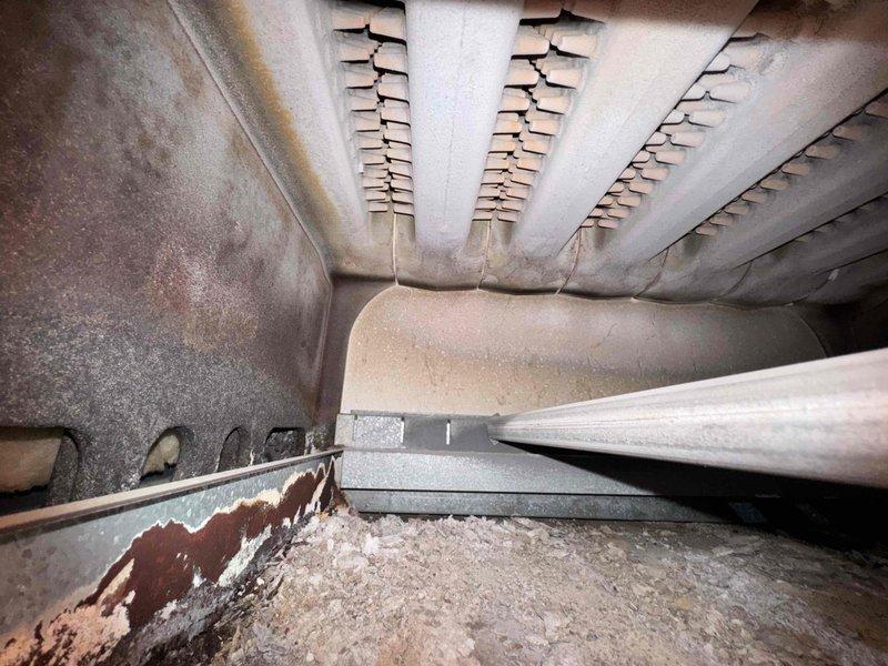 Responded to no heat call for aging boiler system. Upon inspection, found significant corrosion and deterioration in the heat exchanger with visible cracks and rust damage. Replaced failed thermocouple as diagnosed and performed system test to confirm proper ignition and operation.