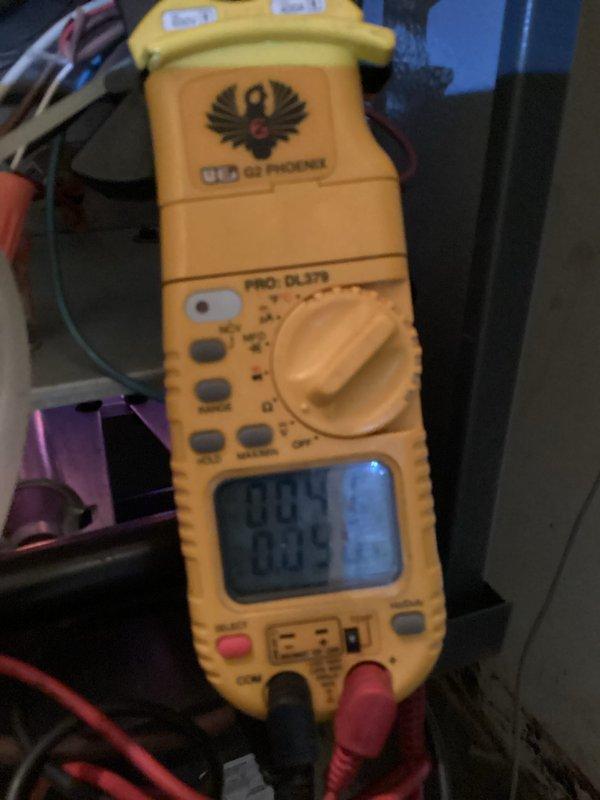Performed routine heating tune-up, inspecting electrical components with UEi G2 Phoenix PRO DL379 multimeter and measuring gas pressure at 3.70 inH₂O with UEI EM152 manometer. System operation verified within manufacturer specifications.