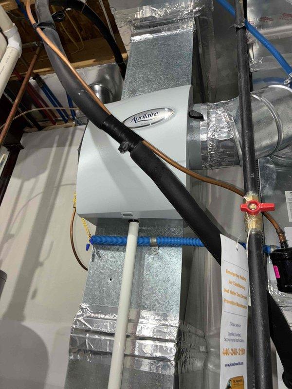 Completed scheduled heating maintenance on furnace system with Aprilaire humidifier. Inspected control board with particular attention to DIP switch settings and wiring connections. All components functioning properly with no issues found.