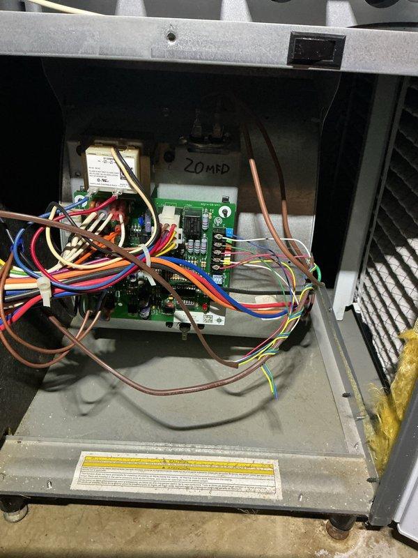 Performed annual maintenance on furnace, inspecting blower motor assembly and control board. Confirmed all wiring connections were secure and properly seated, with particular attention to the 20MFD capacitor. System is operating within normal parameters with no signs of component wear or electrical issues.