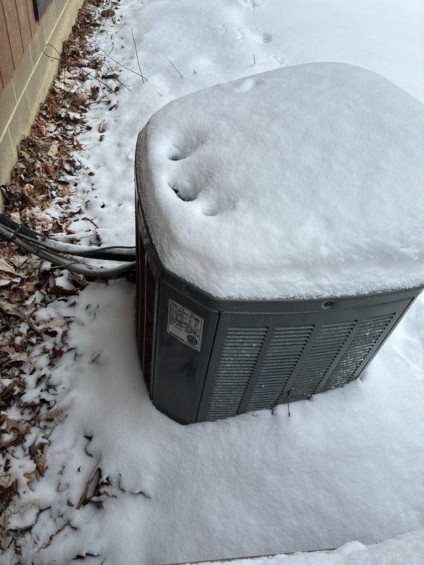 Conducted evaluation of 25+ year old HVAC system for potential replacement options after customer's temporary DIY repair. Inspection revealed aging system components with significant mineral deposits on valve assemblies and an outdoor unit heavily affected by winter conditions. Recommended full replacement due to system age and deteriorating condition.