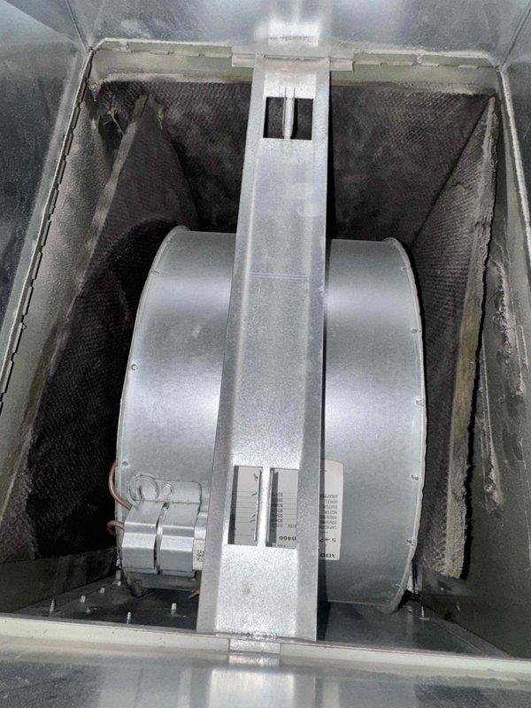 Responded to no heat service call where pilot light would not ignite. Inspected furnace blower wheel assembly and found evidence of condensation within the housing. Cleaned components, relit pilot light, and verified proper system operation.