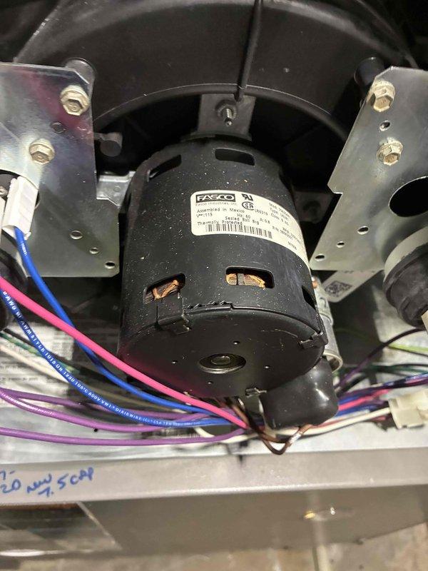 Performed routine heating maintenance on two HVAC systems. Inspected FASCO motor connections and mounting hardware, finding all electrical components in proper working condition. Observed moderate dust accumulation on blower wheel assembly; cleaned between fins to ensure optimal airflow and system efficiency.