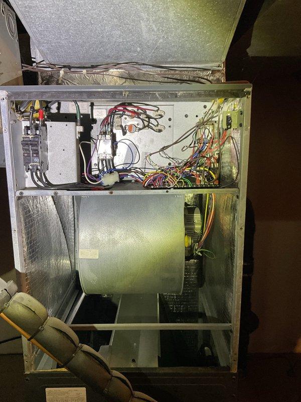 Responded to no-heat call for heat pump system. Diagnosed snow accumulation on outdoor unit restricting airflow and preventing proper defrost cycle operation. Cleared snow from outdoor unit, inspected electrical components and connections, and verified proper system operation after restoration. Heat successfully restored to residence.