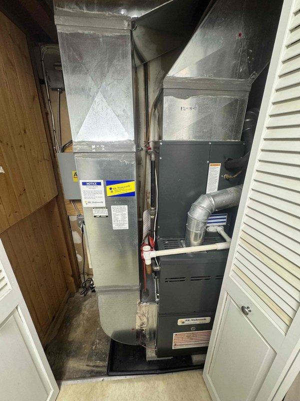 Responded to service call regarding thermostat communication issues with furnace. Customer reported having to maintain thermostat at 70 degrees for proper operation. Conducted visual inspection of furnace unit and air handler system housed in utility closet. Identified and resolved communication issue between thermostat and furnace control board. System now functioning properly with accurate temperature control.
