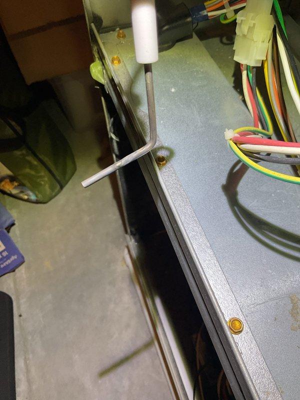 Diagnosed intermittent furnace operation causing no heat condition. Inspected electrical connections and flame sensor assembly, finding significant carbon buildup on sensor probe. Cleaned flame sensor rod to restore proper flame detection and system operation. Unit now functioning normally with consistent heat.