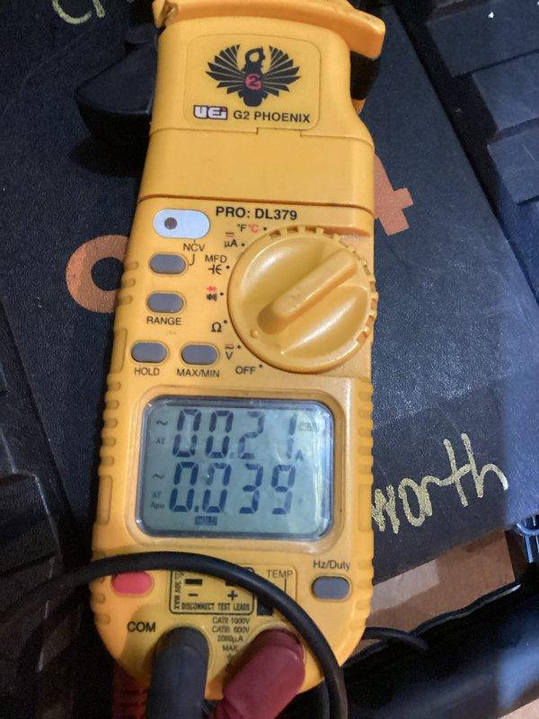 Performed heating tune-up on two older HVAC systems. Conducted electrical measurements with UEi G2 PHOENIX multimeter to verify proper voltage and current readings. Inspected Aprilaire whole-home humidifier installation and connection to ductwork, confirming all components were in good working condition.