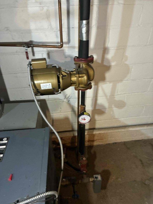 Performed scheduled maintenance on boiler system. Located and repaired leaking copper pipe junction in basement utility area that was causing water accumulation beneath piping. Inspected circulation pump and pressure gauge on main vertical line; both components functioning properly with no issues detected.