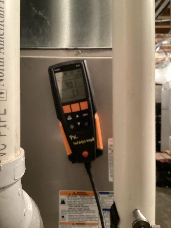 Performed heating maintenance on two systems. Conducted combustion analysis using Testo 310 analyzer, measuring flue gas temperature (850°F/90.1°F) and CO2/O2 levels (72/7.1) to verify proper combustion efficiency. All systems operating within manufacturer specifications after service.