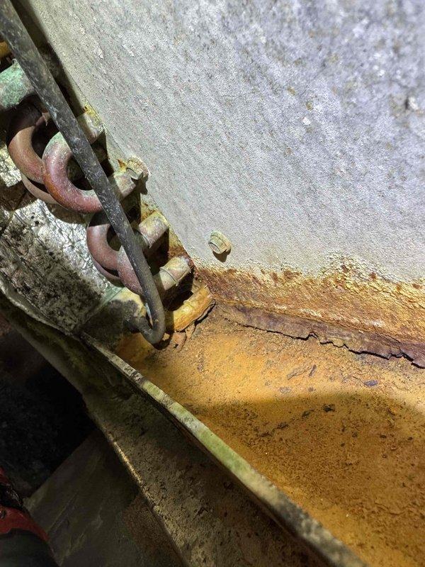 Performed scheduled heating maintenance on HVAC system. Discovered significant corrosion and oxidation on heat exchanger components. Temperature readings indicated system operating at 16.2°F, significantly below optimal range, suggesting potential refrigerant or airflow issues requiring immediate attention.