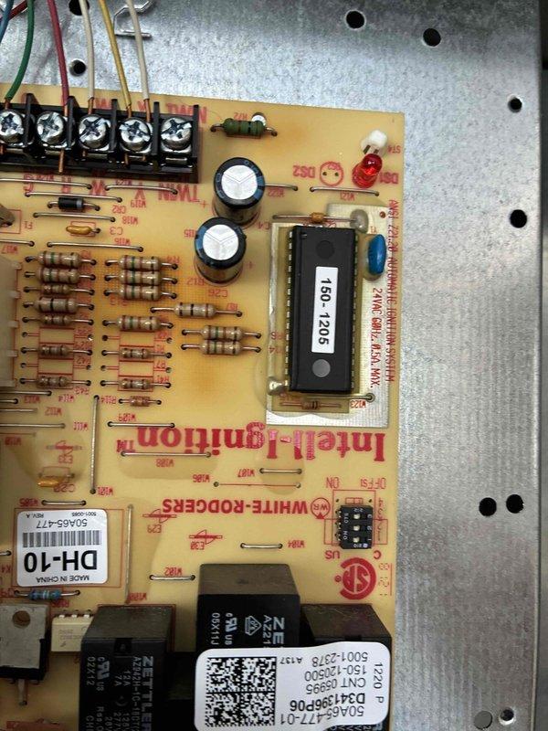 Performed routine monthly heating maintenance service on HVAC system. Inspected control board components including White-Rodgers F60-1205 circuit board, capacitors, and terminal connections. Checked pressure switch functionality and verified proper connection of control wiring and pressure hose to ensure safe system operation.