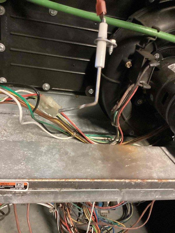 Performed scheduled heating maintenance on furnace system. Conducted electrical diagnostics with clamp meter to verify proper component operation. Inspected ignition assembly and heat exchanger for proper functionality. Identified pet dander accumulation in ductwork as source of odor from vent and addressed uneven heating distribution in room.