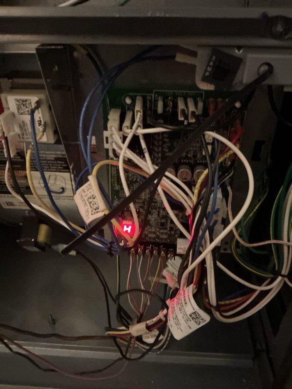 Responded to emergency call for furnace not producing heat in system of unknown age. Upon inspection, found control board issue evidenced by diagnostic LED indicator and inspected internal wiring connections. Performed necessary repairs to restore proper heating function and verified system operation before completion.