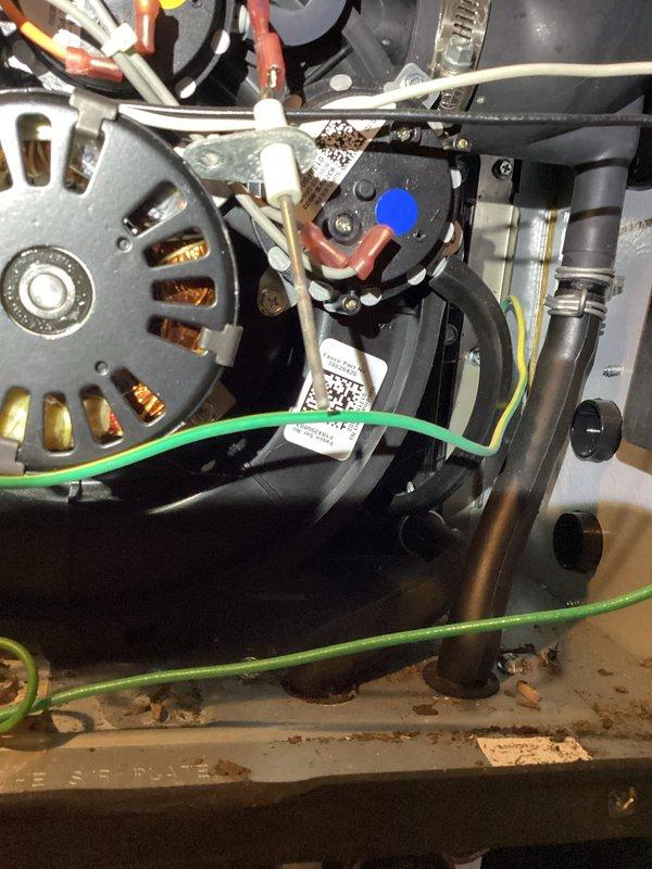 Performed routine heating maintenance on dual system setup. Inspected blower wheel assembly and motor components for proper operation. Visual examination confirmed all electrical connections are secure with no signs of wear on the motor windings or capacitor.