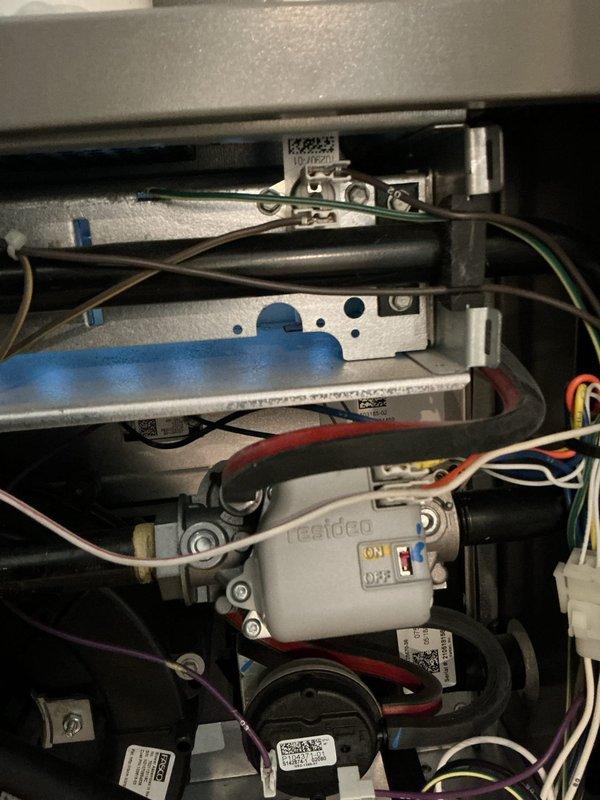 Responded to no-heat service call for a furnace system less than 5 years old that was running continuously without maintaining set temperature. Upon inspection of the Resideo gas valve and Nestec blower motor assembly, diagnosed and corrected an electrical control issue that was preventing proper cycling. System now operating normally with restored heating function.