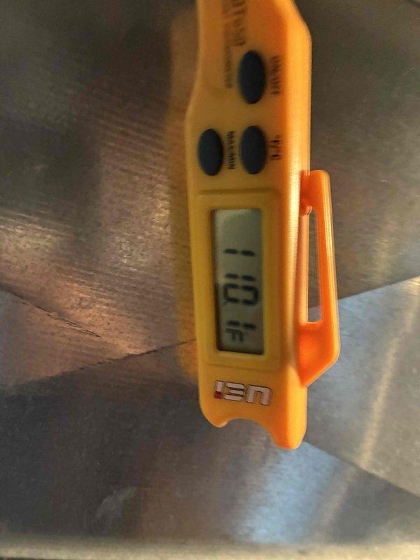 Performed scheduled monthly heating maintenance service. Conducted temperature measurements using UEi digital thermometer at system components, recording readings of 59°F and 0°F at different test points. All parameters within normal operating range.