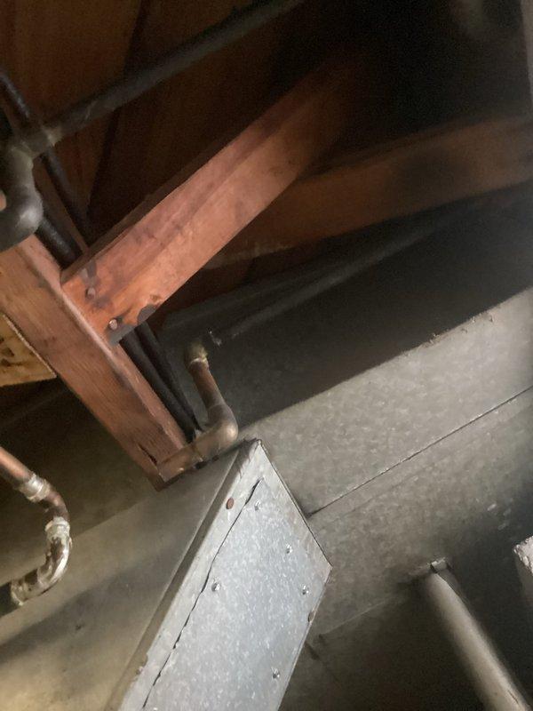 Responded to customer report of non-functioning light fixtures following recent HVAC installation. Inspected electrical panel, identifying tripped breakers resulting from power cycling during the previous installation. Reset affected circuits and verified proper operation of all lighting fixtures in office and hallway areas.