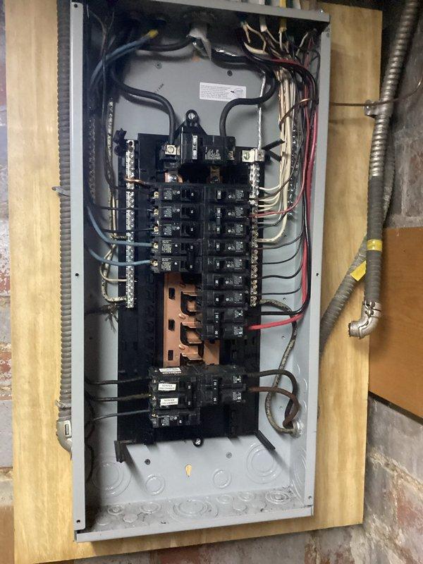 Responded to customer report of non-functioning light fixtures following recent HVAC installation. Inspected electrical panel, identifying tripped breakers resulting from power cycling during the previous installation. Reset affected circuits and verified proper operation of all lighting fixtures in office and hallway areas.