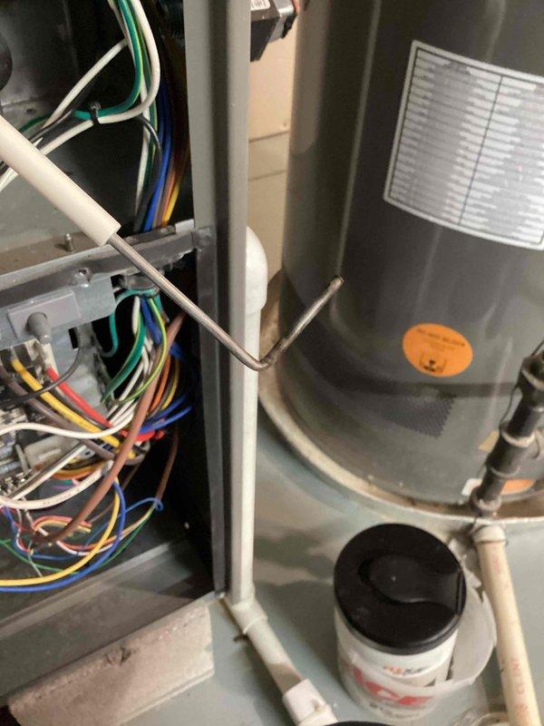 Performed scheduled monthly heating maintenance on residential HVAC system. Inspected electrical connections at control panel and verified proper wiring integrity. Examined blower motor assembly and internal components for normal operation with no issues detected.