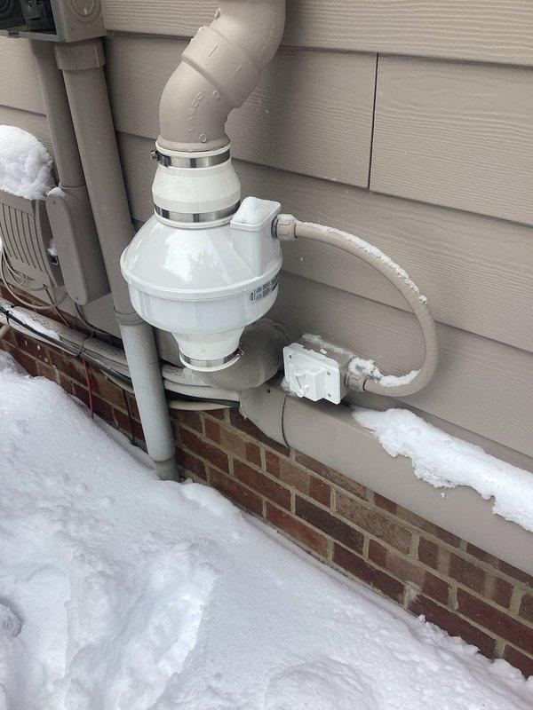 Conducted comprehensive electrical inspection of the property, examining both exterior electrical components near the radon mitigation system and interior ceiling-mounted smoke/CO detectors. All systems were verified to be properly installed and functioning according to code requirements.