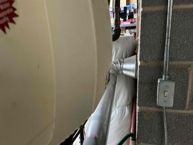 Conducted full system replacement estimate for aging HVAC equipment. Inspected mechanical room with limited clearance between equipment and concrete block wall. Documented existing installation including insulated ductwork, piping configuration, and electrical connections to determine optimal replacement options.