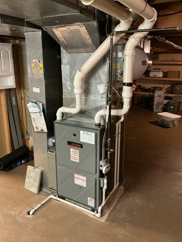 Conducted comprehensive evaluation of 20+ year old HVAC system featuring a furnace with confirmed cracked heat exchanger and aging AC unit. Documented current system configuration including control board circuitry and furnace installation with associated ductwork and ventilation components. Prepared full system replacement estimate for residential property as requested by customer.