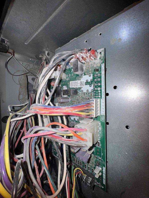 Responded to no-heat call for residential furnace. Diagnosed failed control board as evidenced by improper signal processing in the main circuit module. Replaced control board, verified proper connections of all wiring harnesses, and confirmed system operation through complete heating cycle test. Unit now functioning within manufacturer specifications.