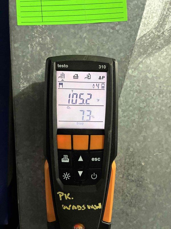 Performed heating system maintenance service including combustion efficiency testing with Testo 310 analyzer (measured 105.2°F temperature with 7.7% O₂ levels). Inspected and verified proper operation of the 370VAC Genteq capacitor (model 271 570S) connected to the system motor. All components functioning within normal parameters.