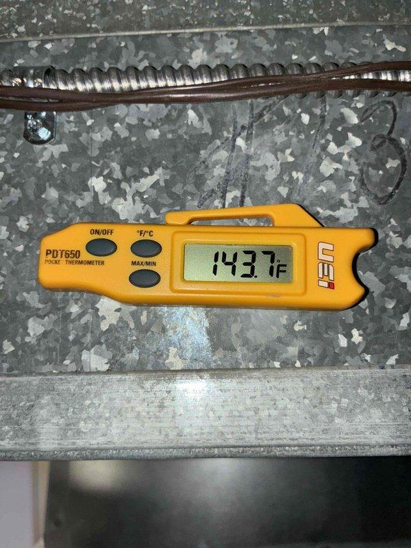Performed scheduled furnace maintenance service including complete combustion analysis with Testo 310 analyzer (readings: O₂ 10.5%, CO₂ 5.87%) and temperature verification of system operation (supply air temperature 143.7°F). All readings within manufacturer specifications confirming proper combustion efficiency and safe operation.