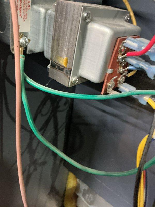 Replaced defective pilot assembly and control box on heating system. Removed old UTEC control module and installed new one, ensuring proper connection of all wiring including MV, MV/PV, PV, ground, and spark terminals. System is now operating within manufacturer specifications.