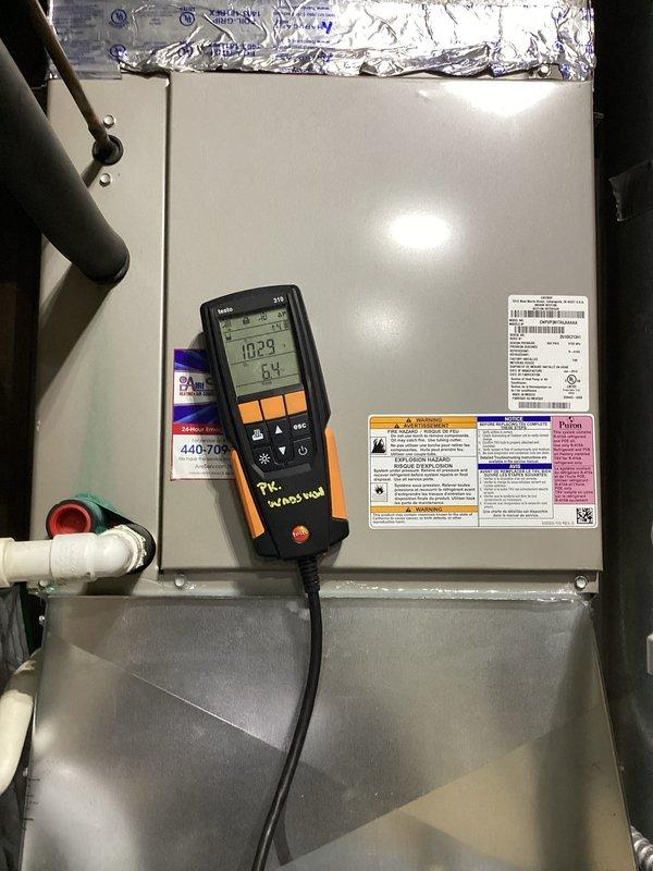 Performed routine furnace maintenance including electrical diagnostic testing with UEi G2 PHOENIX PRO multimeter showing readings within normal parameters. Conducted combustion analysis using Testo analyzer which displayed readings of 10.29% and 64, indicating proper furnace operation and acceptable combustion efficiency.