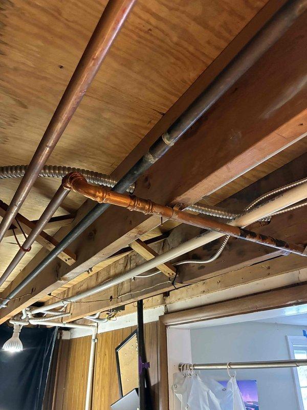 Performed warranty service on boiler system, including complete refill and bleeding procedure to remove air from the system. Inspected copper piping and associated fittings in utility area for potential replacement needs. System was successfully restored to proper operation with no parts requiring immediate replacement.