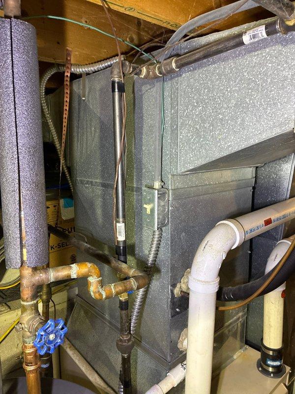 Conducted comprehensive evaluation of 23-year-old Amana HVAC system for potential replacement. Observed significant age-related wear on copper lines with visible oxidation and mineral deposits at connection points. System inspection revealed outdated furnace/air handler unit with deteriorating components. Provided customer with multiple full system replacement options and specifications to address aging equipment concerns while maintaining existing heating functionality.